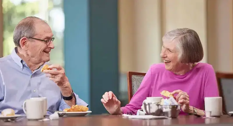 Senior couple having breakfast together