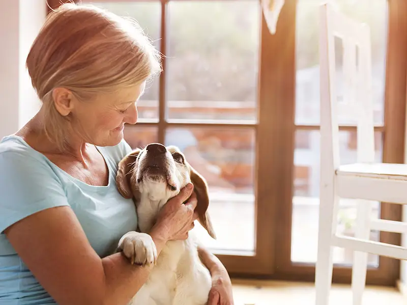 Senior with pet