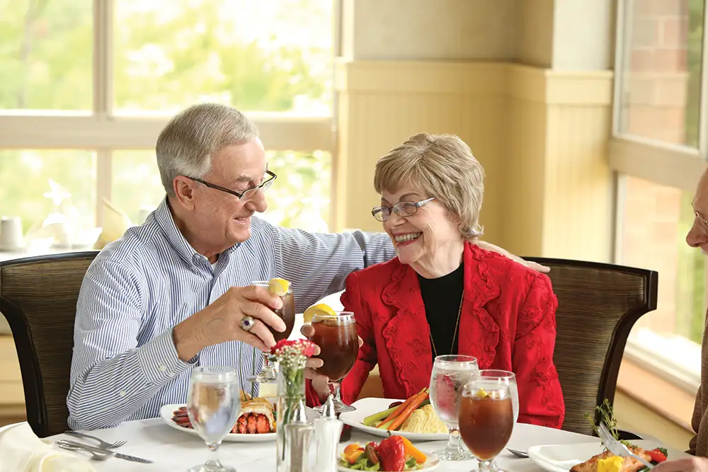 Residents enjoying a meal.